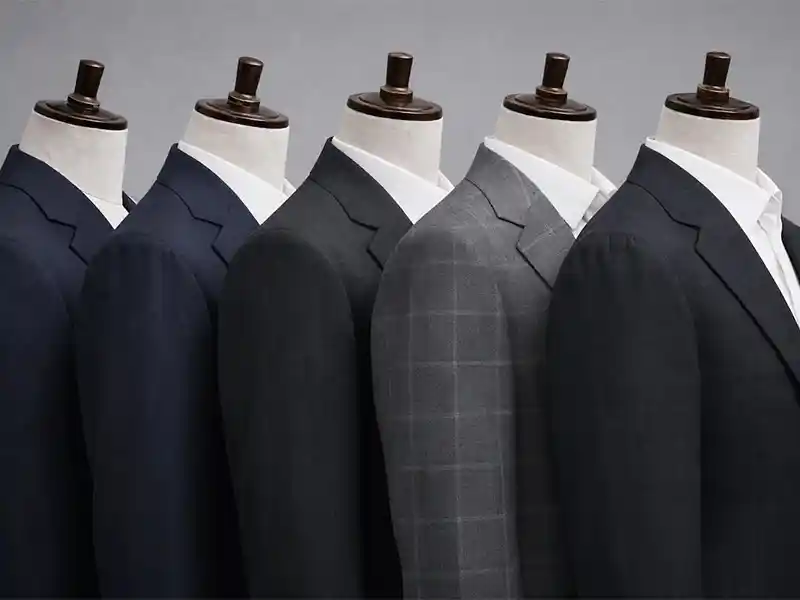 Specialized shoulder construction capabilities including Spalla Camicia and Roped shoulders for men’s suits.